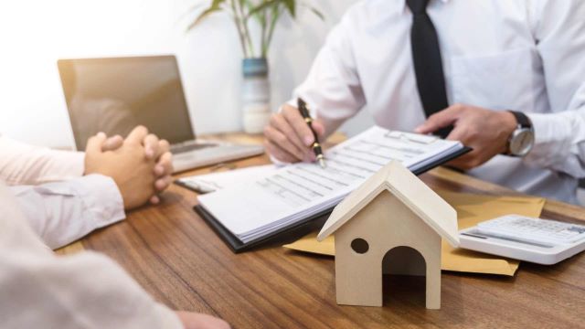 landlord showing lease agreement to tenant